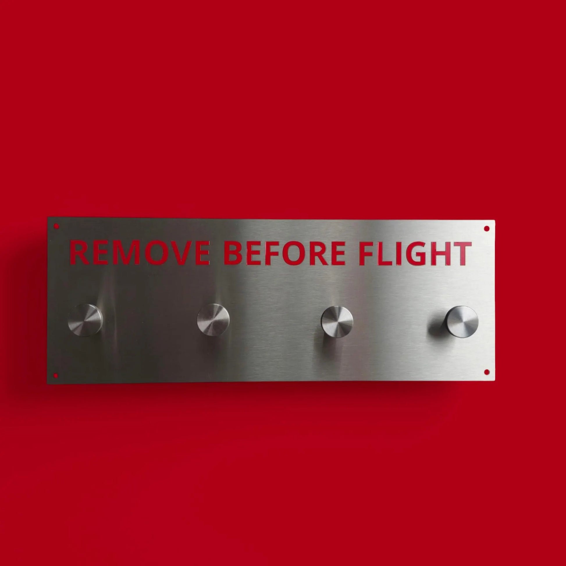 Remove before flight hanger