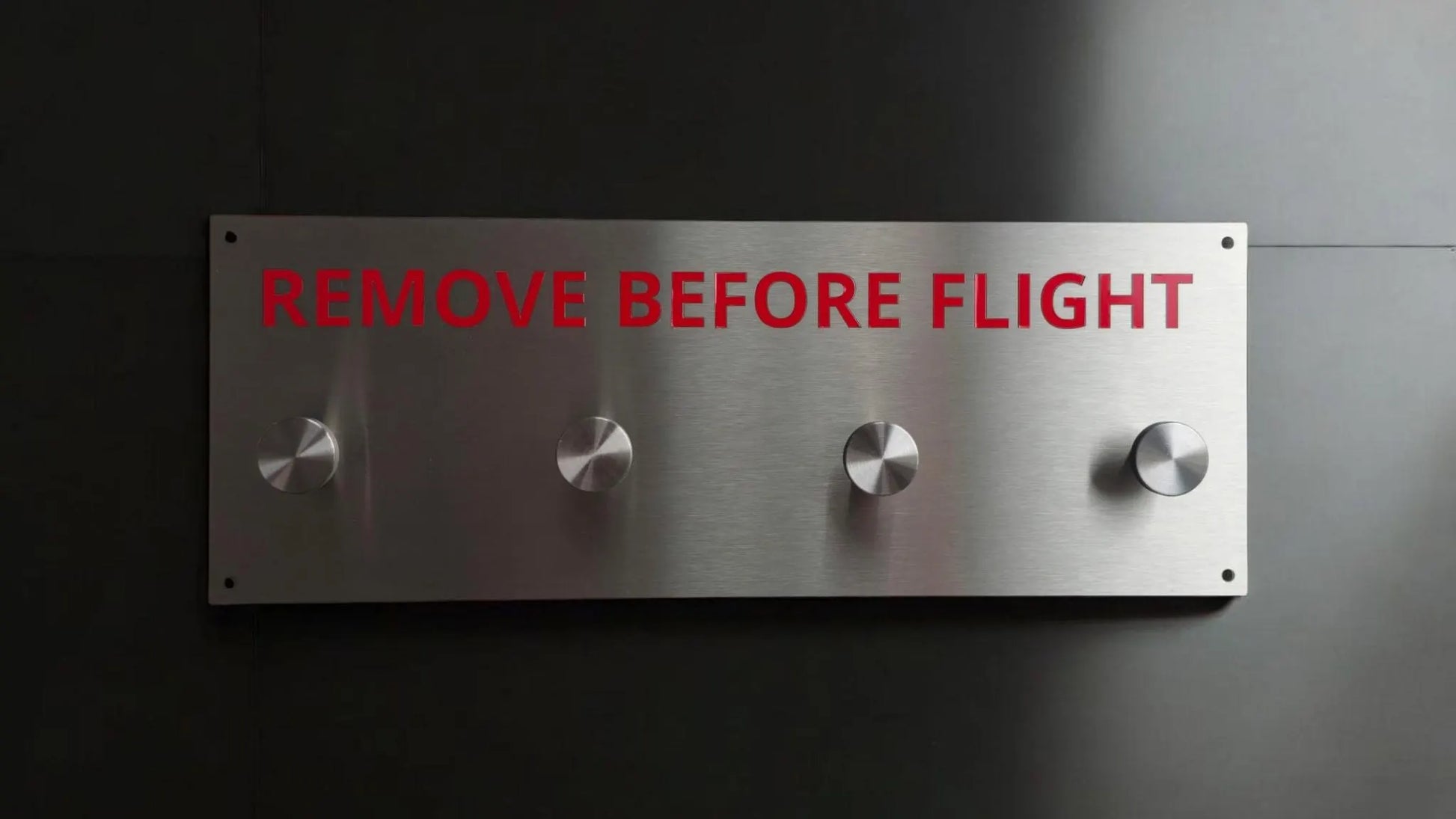 Remove before flight hanger