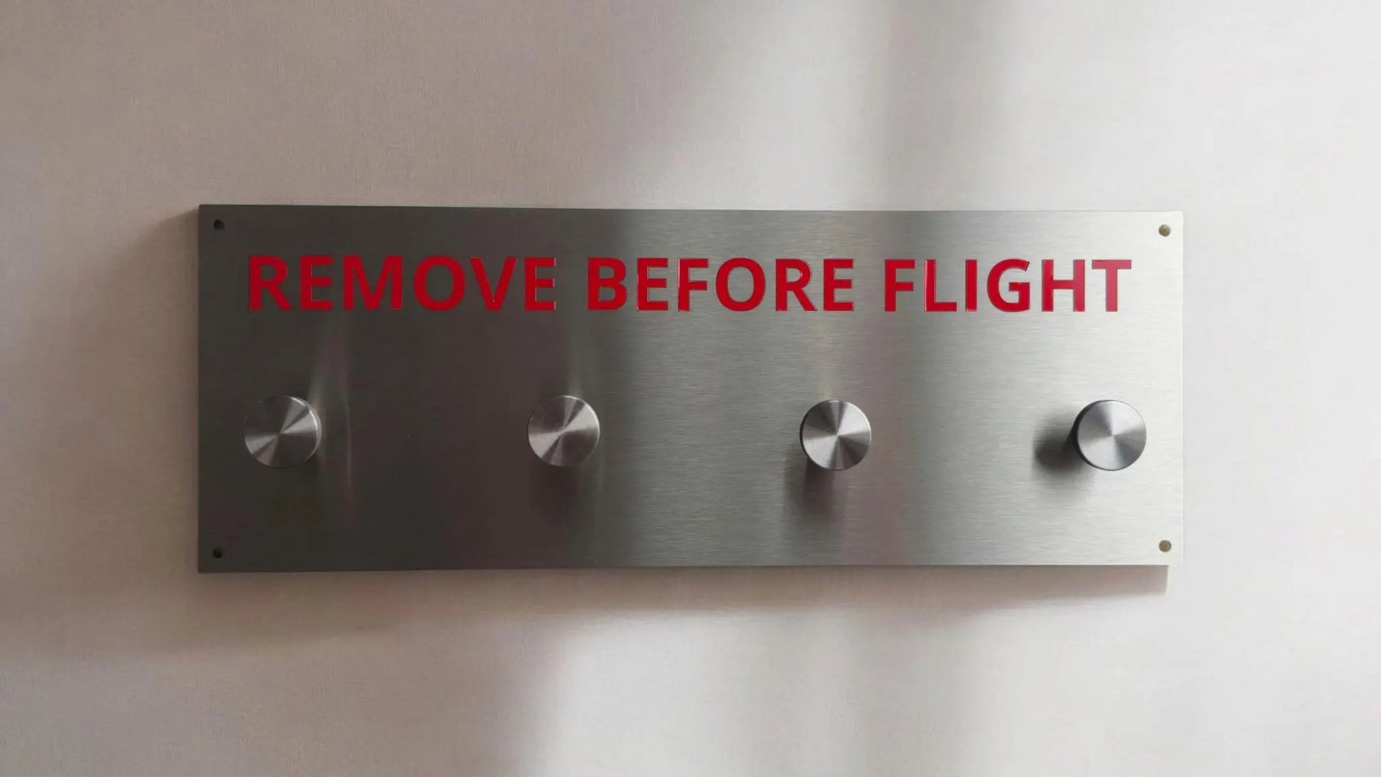 Remove before flight hanger